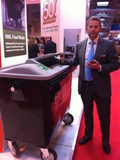 Taylor chief executive David Williams with the communal food waste bin developed by the company for use by Edinburgh council